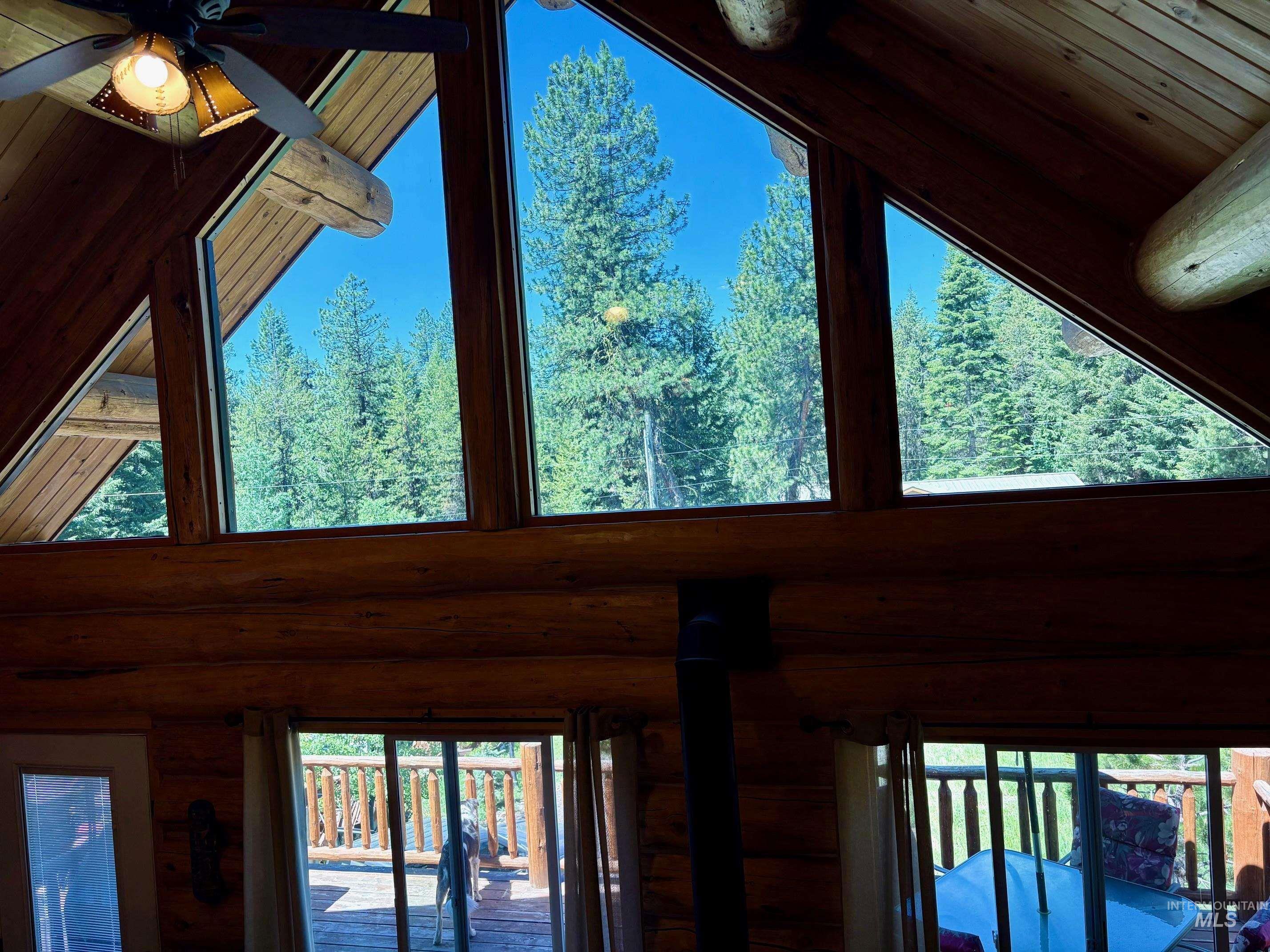Detailed view of ceiling fan and wood ceiling