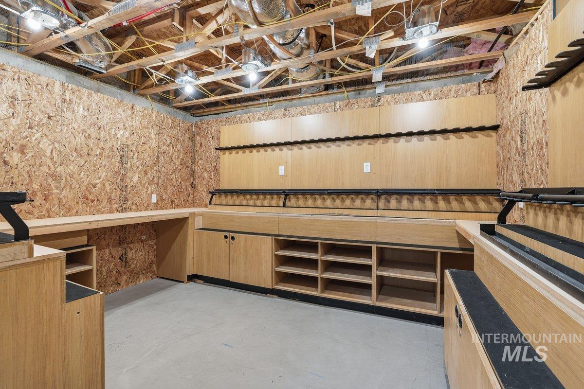 With safe door access built in and concrete flooring and plenty of shelving