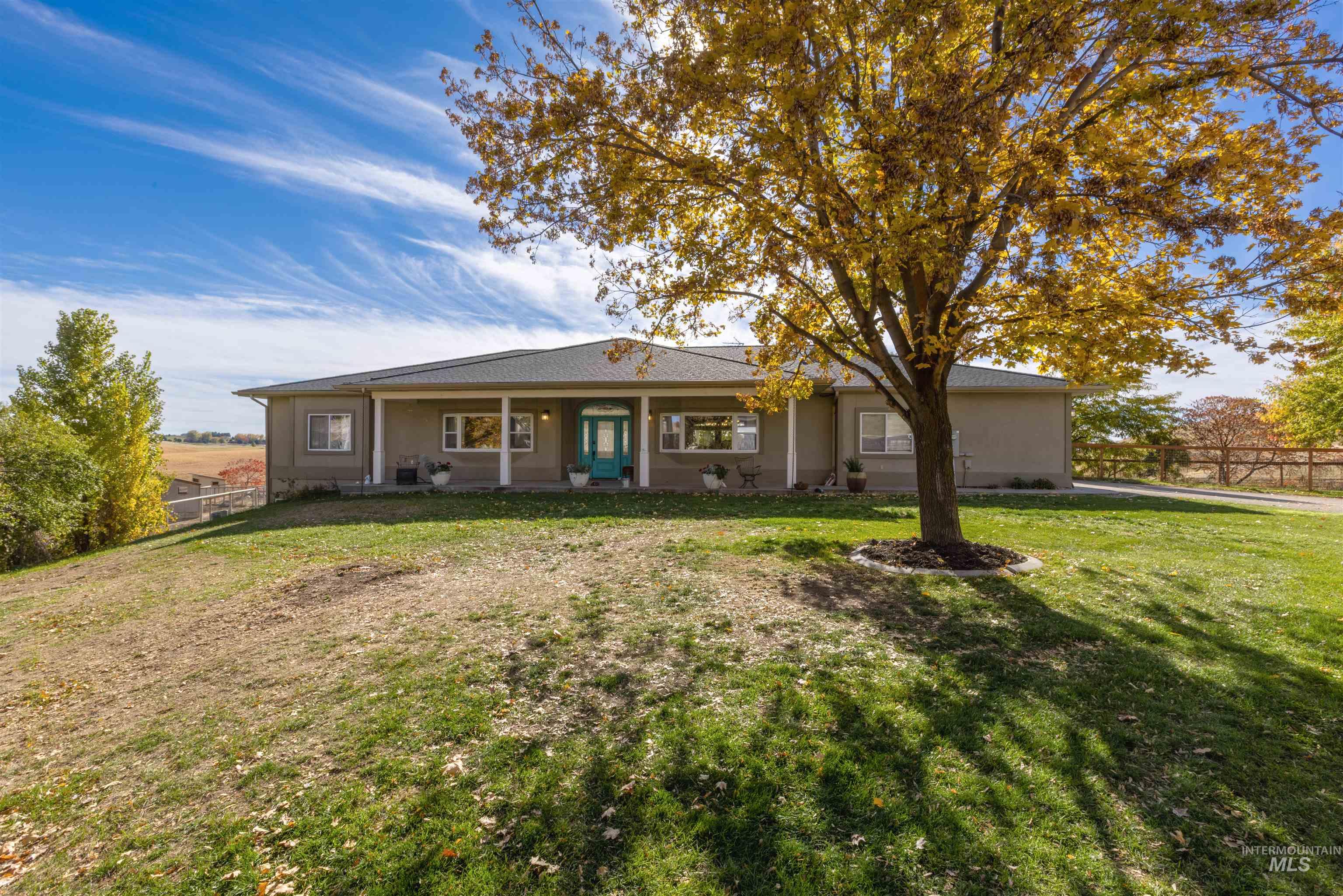 View of front of property featuring stucco siding