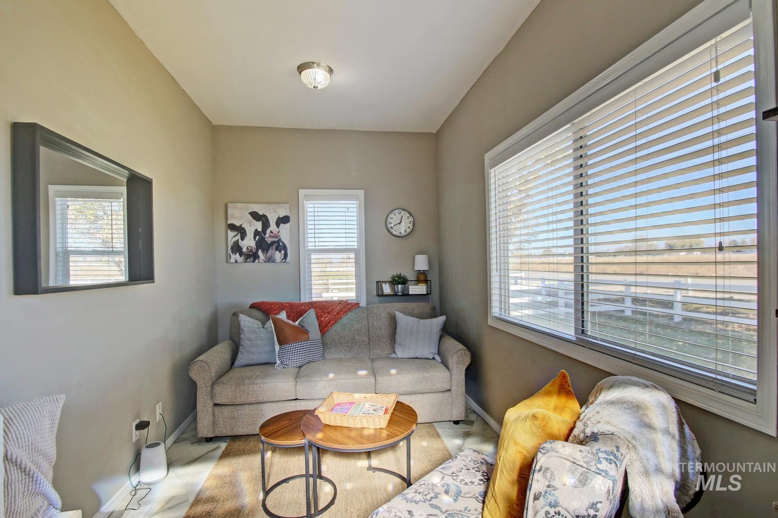 Living room featuring baseboards
