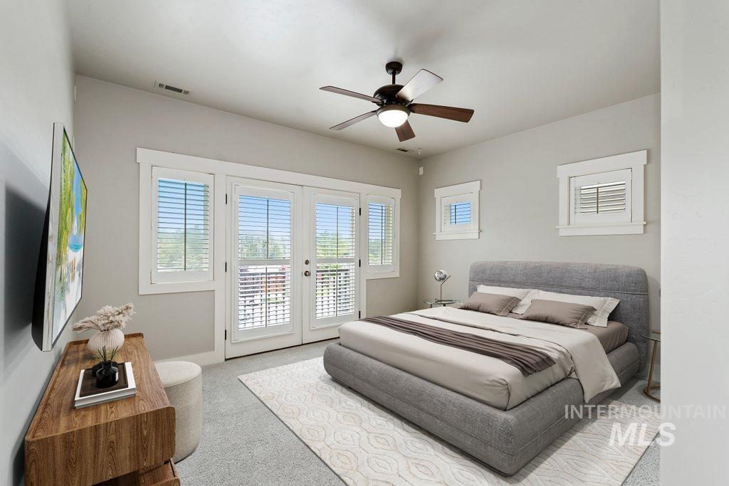 Bedroom with access to exterior, carpet flooring, ceiling fan, and french doors