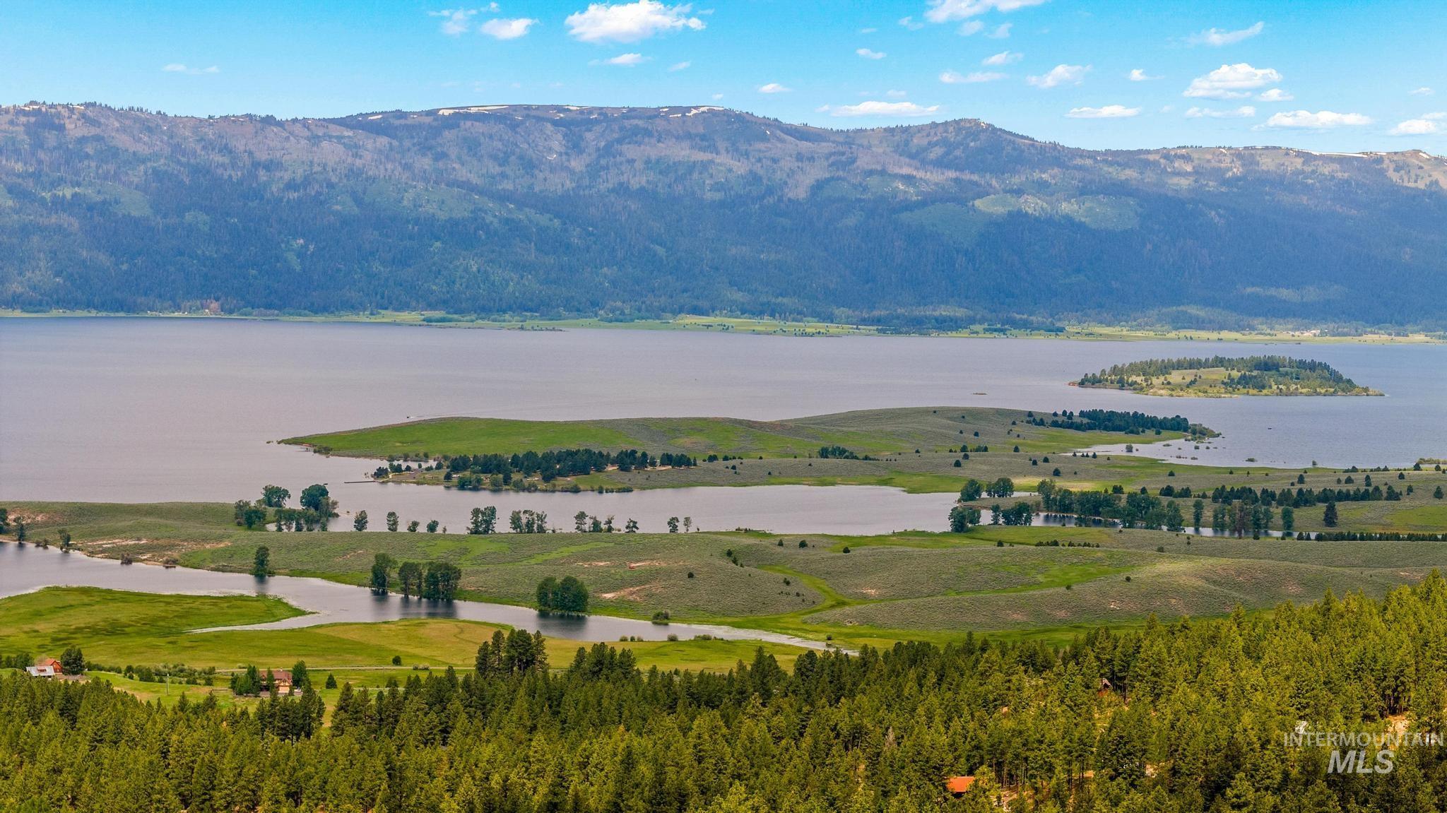 Mountain view featuring a nearby body of water