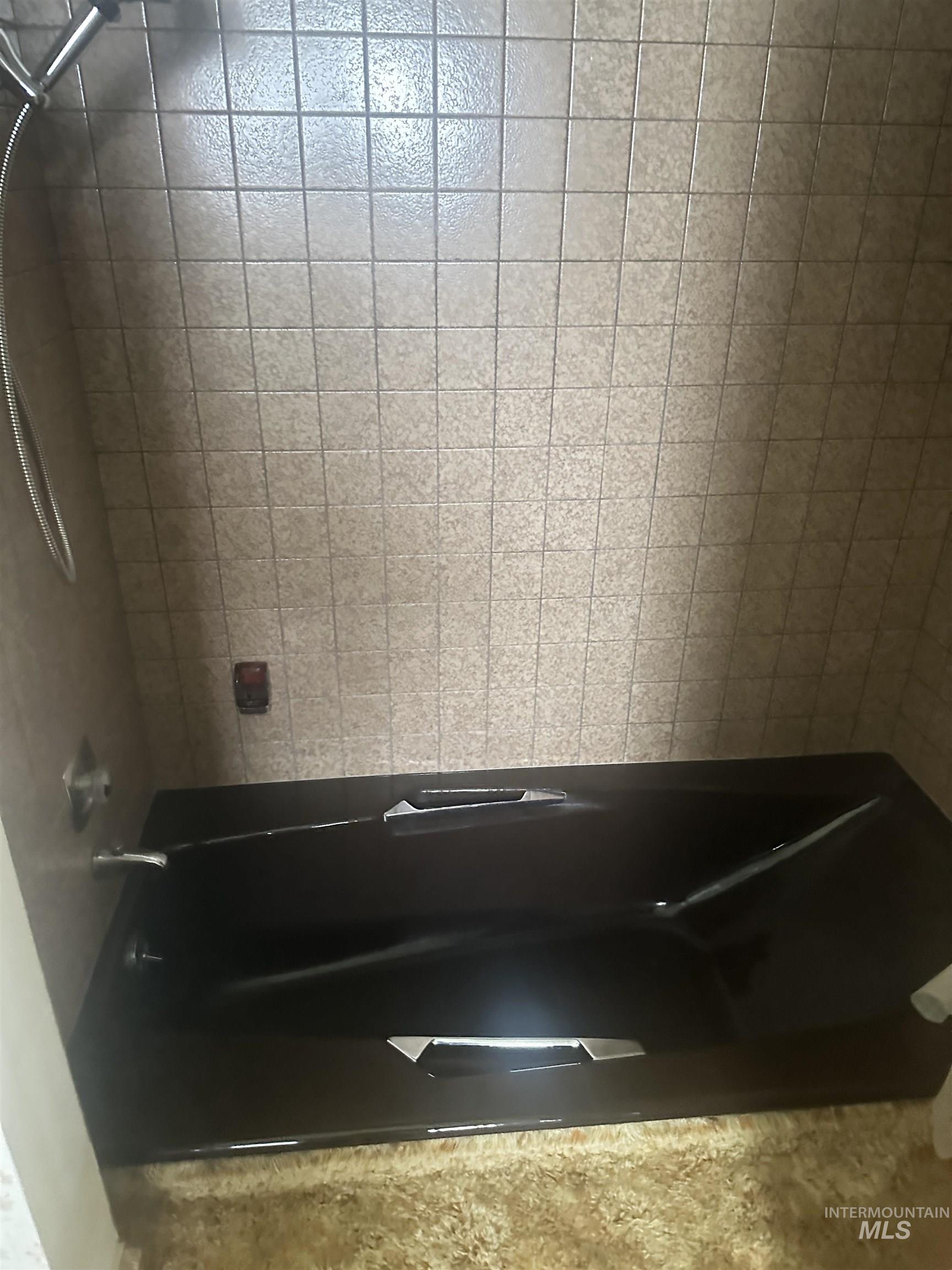 Full bathroom featuring shower / bath combination