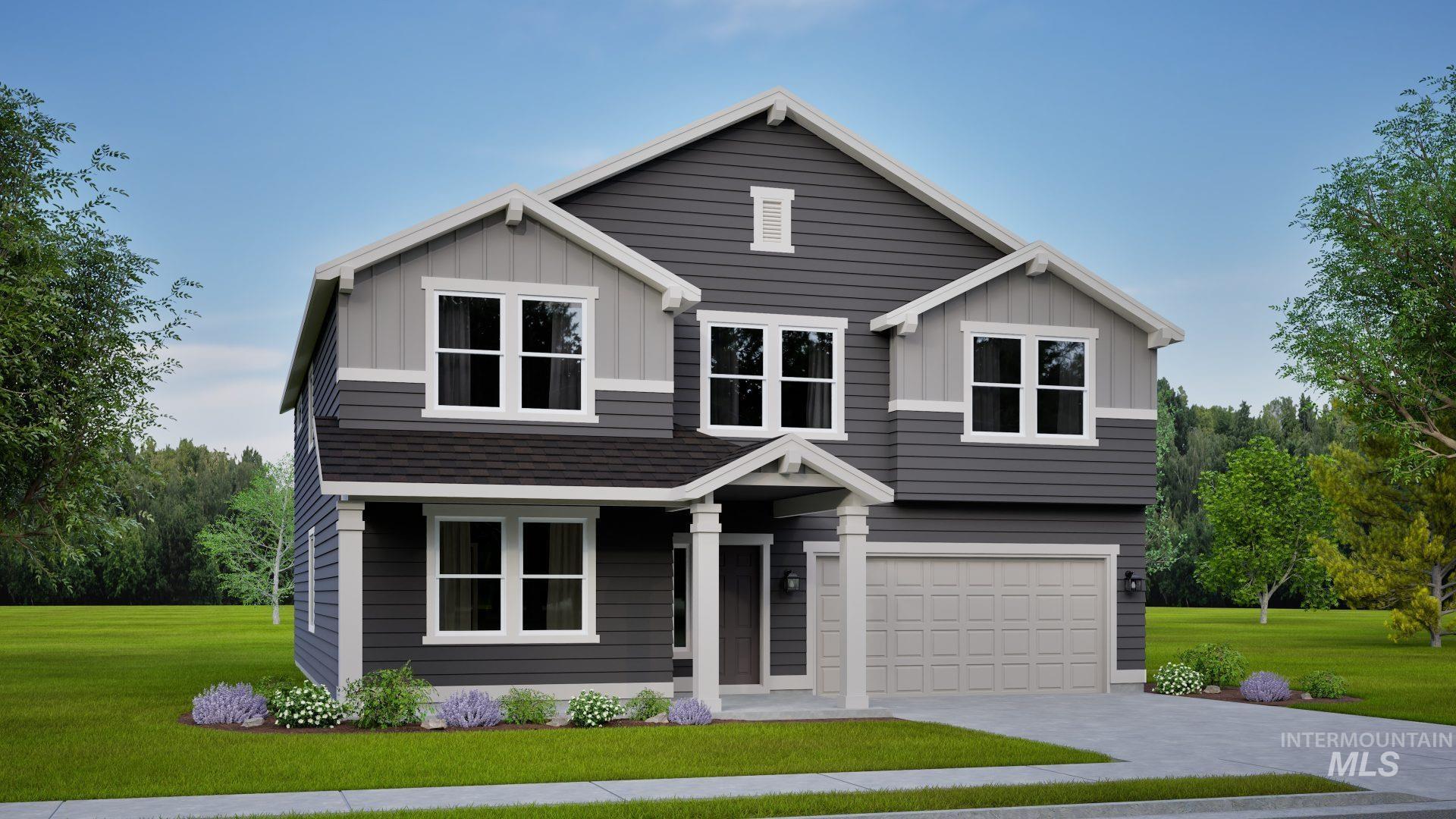 View of front of property featuring a front yard, an attached garage, driveway, and board and batten siding