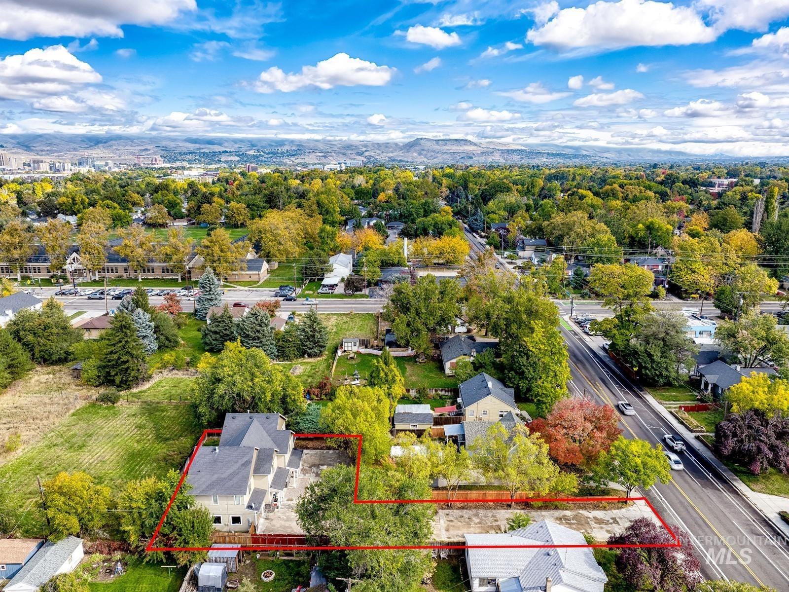 Aerial overview of property's location featuring property parcel outlined
