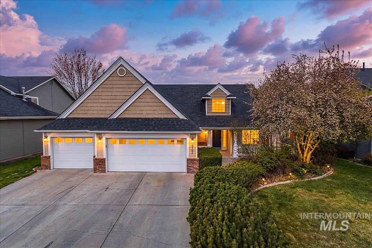 Two-car garage with overhead doors and transom windows