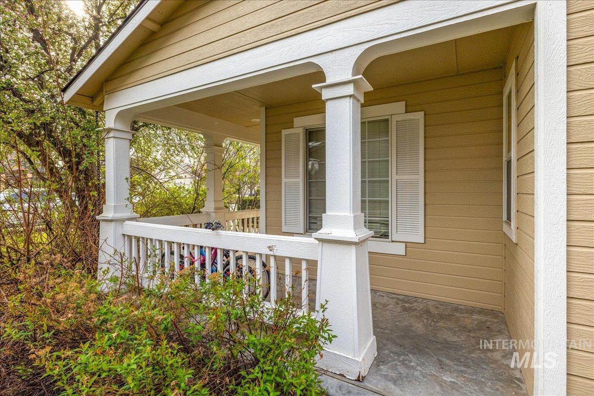 Property entrance featuring covered porch
