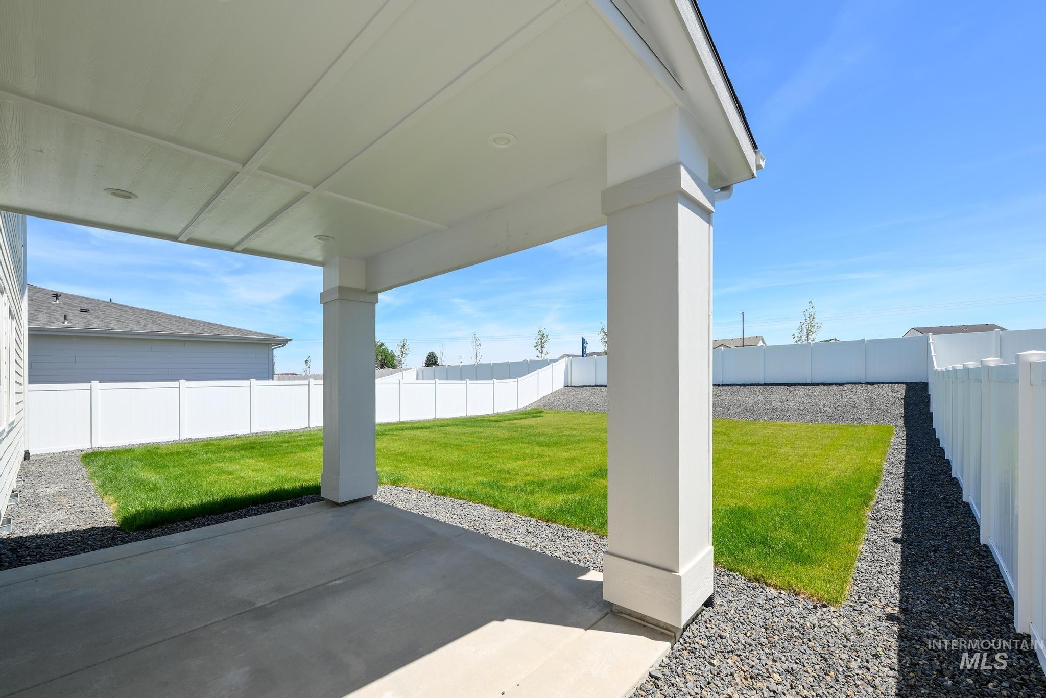 Fenced backyard featuring a patio area
