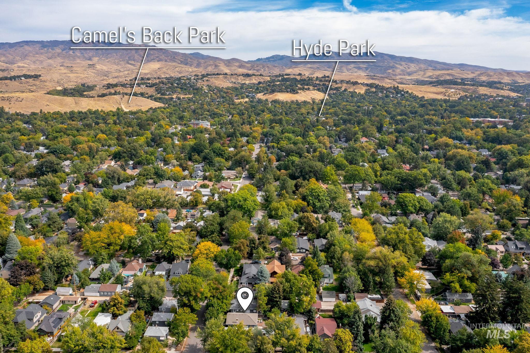 Aerial view of residential area with mountains