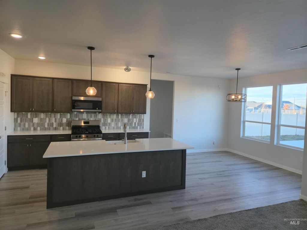 Photo of 7092 W Grand Rapids Dr, Meridian, ID 83646 (MLS # 98969649)