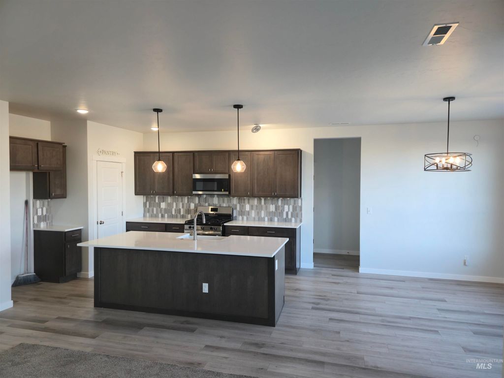 Photo of 7092 W Grand Rapids Dr, Meridian, ID 83646 (MLS # 98969649)