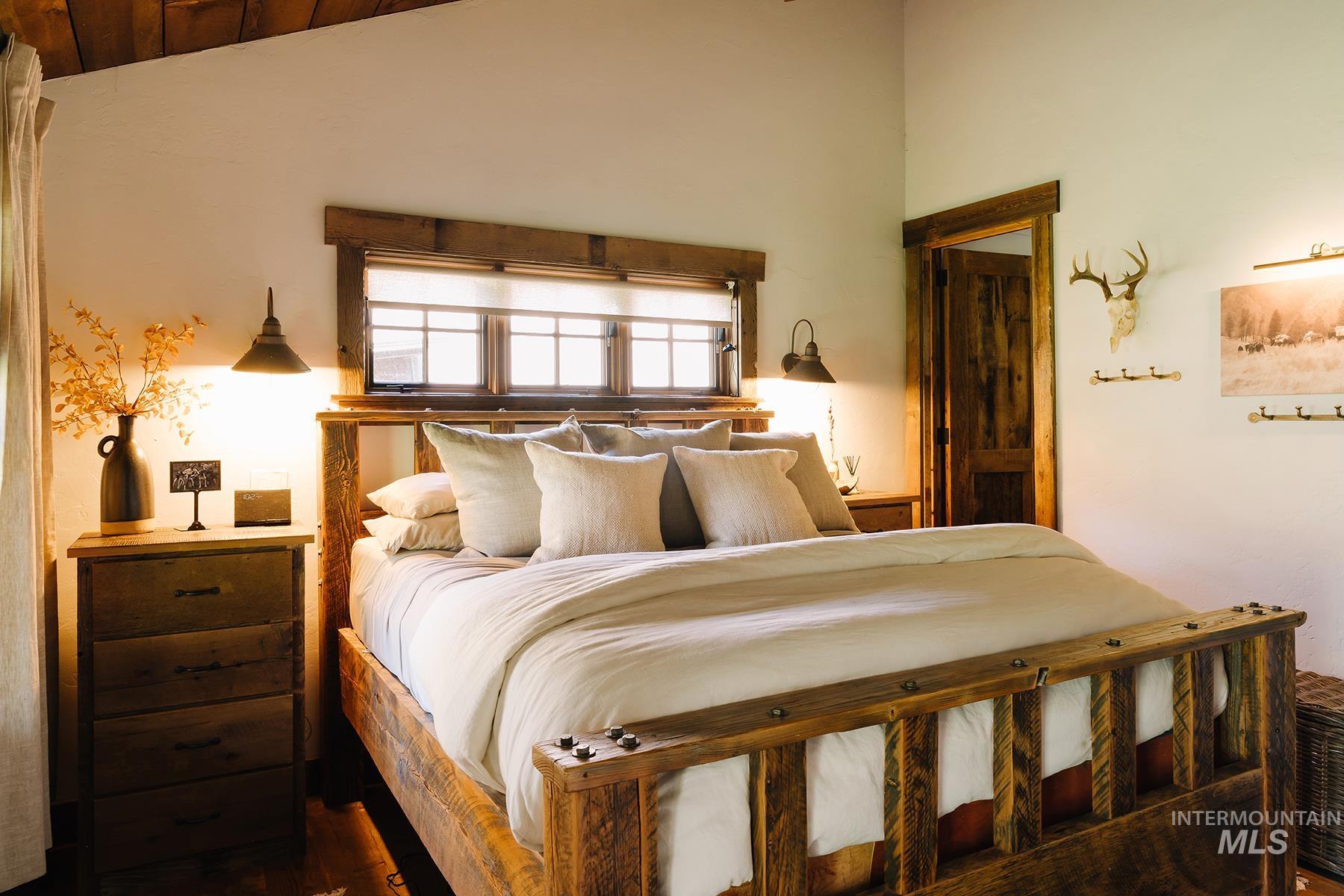 Bedroom with vaulted ceiling