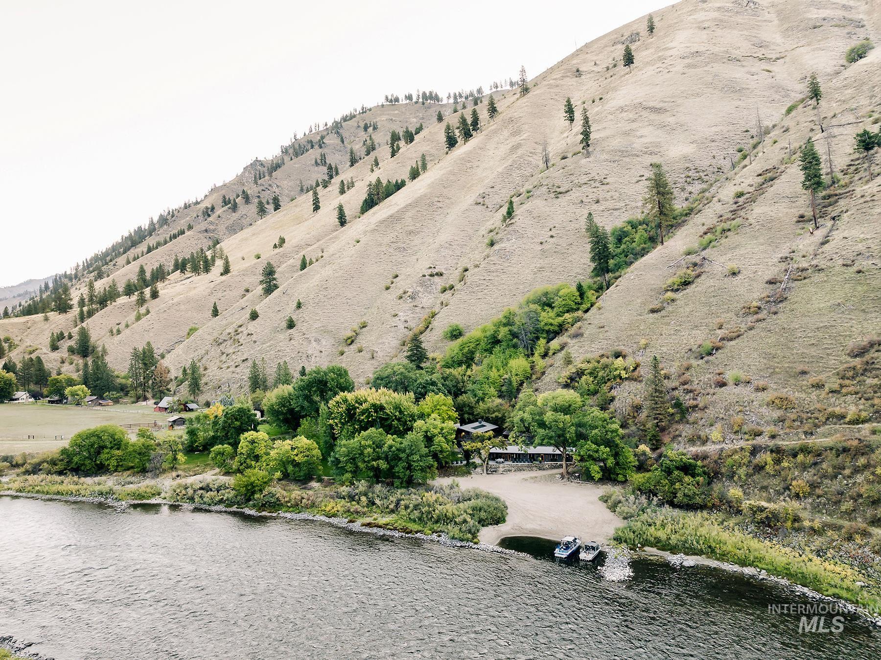 View of community with a water and mountain view