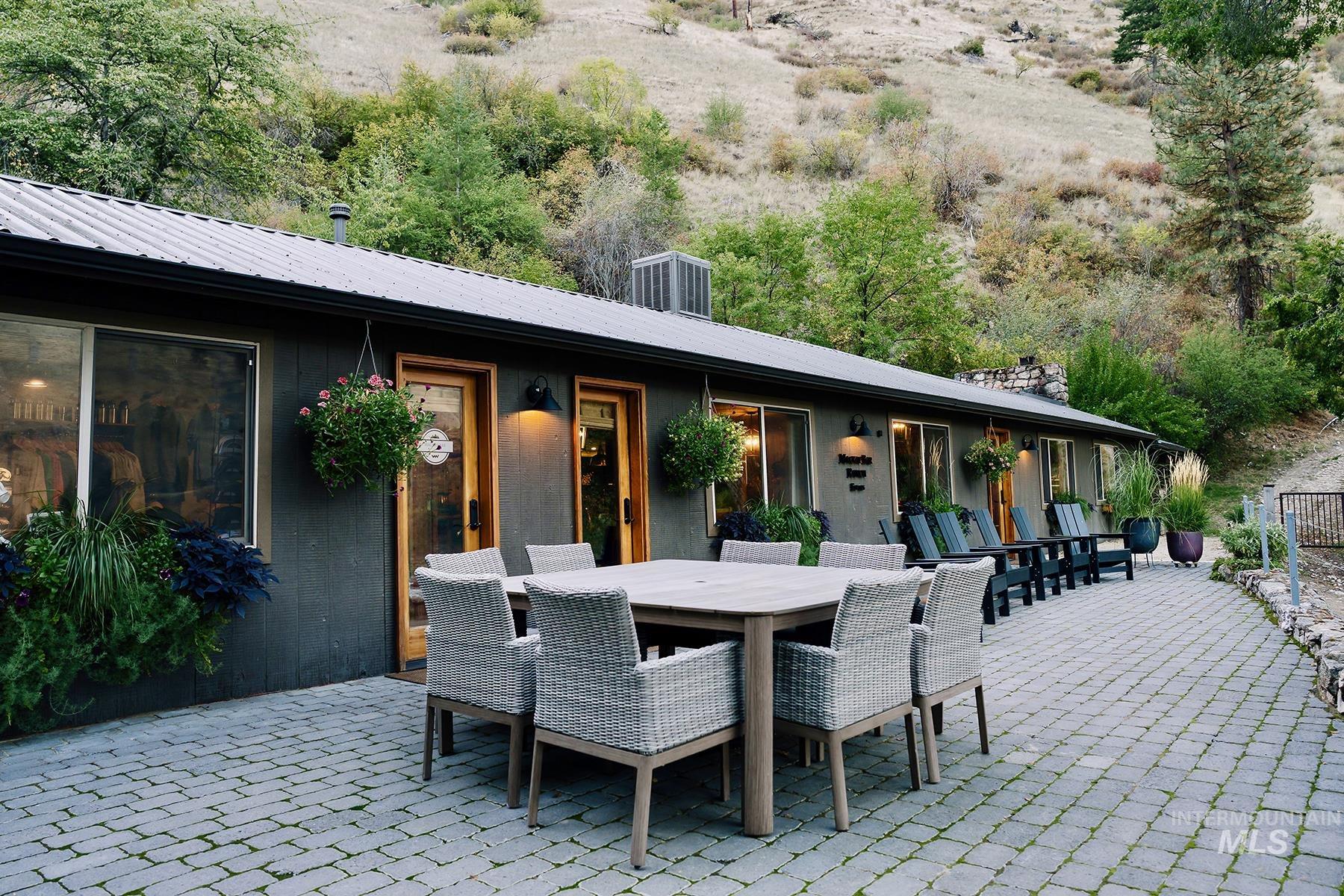 View of patio featuring outdoor dining area