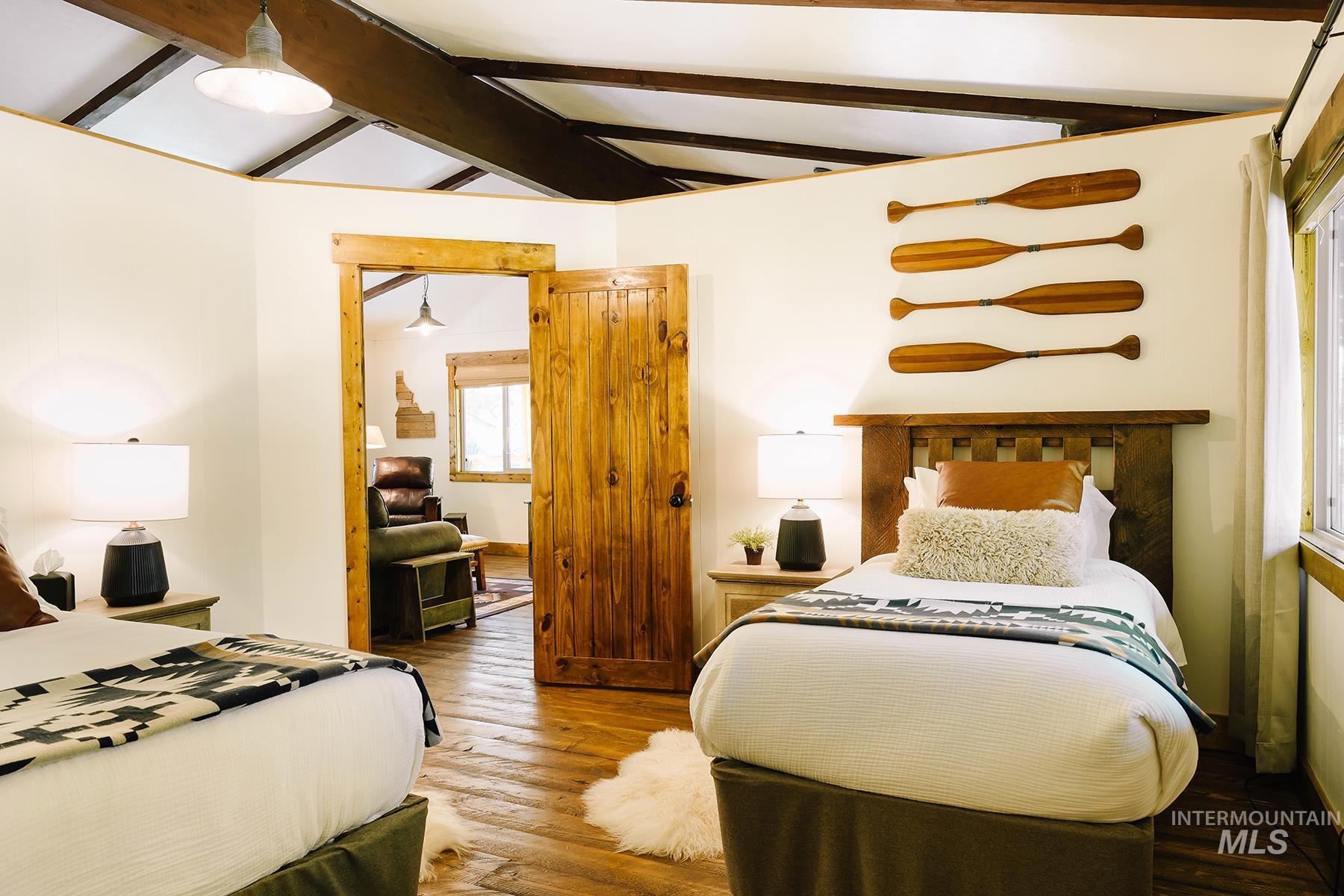 Bedroom with wood finished floors