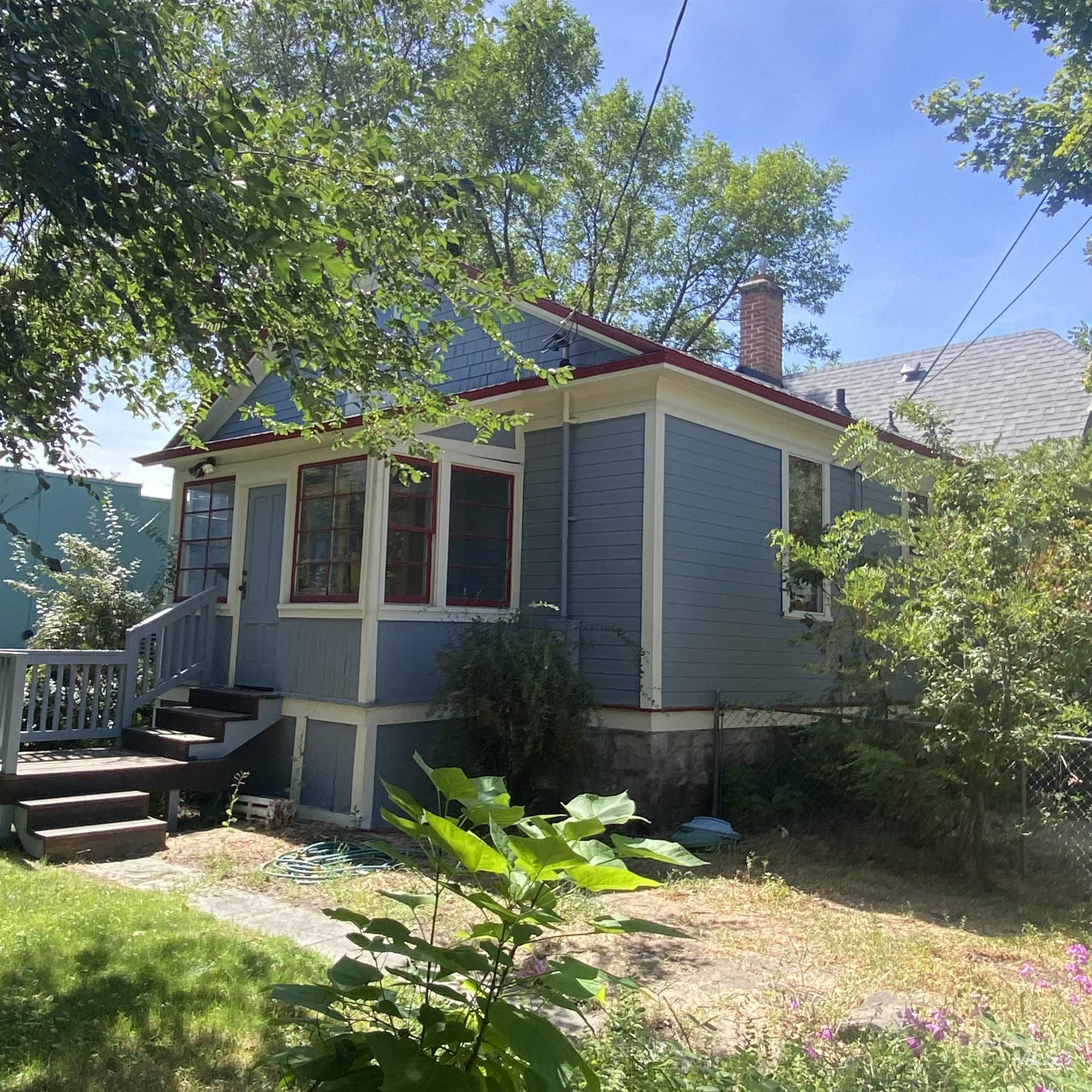 View of home's exterior featuring a chimney
