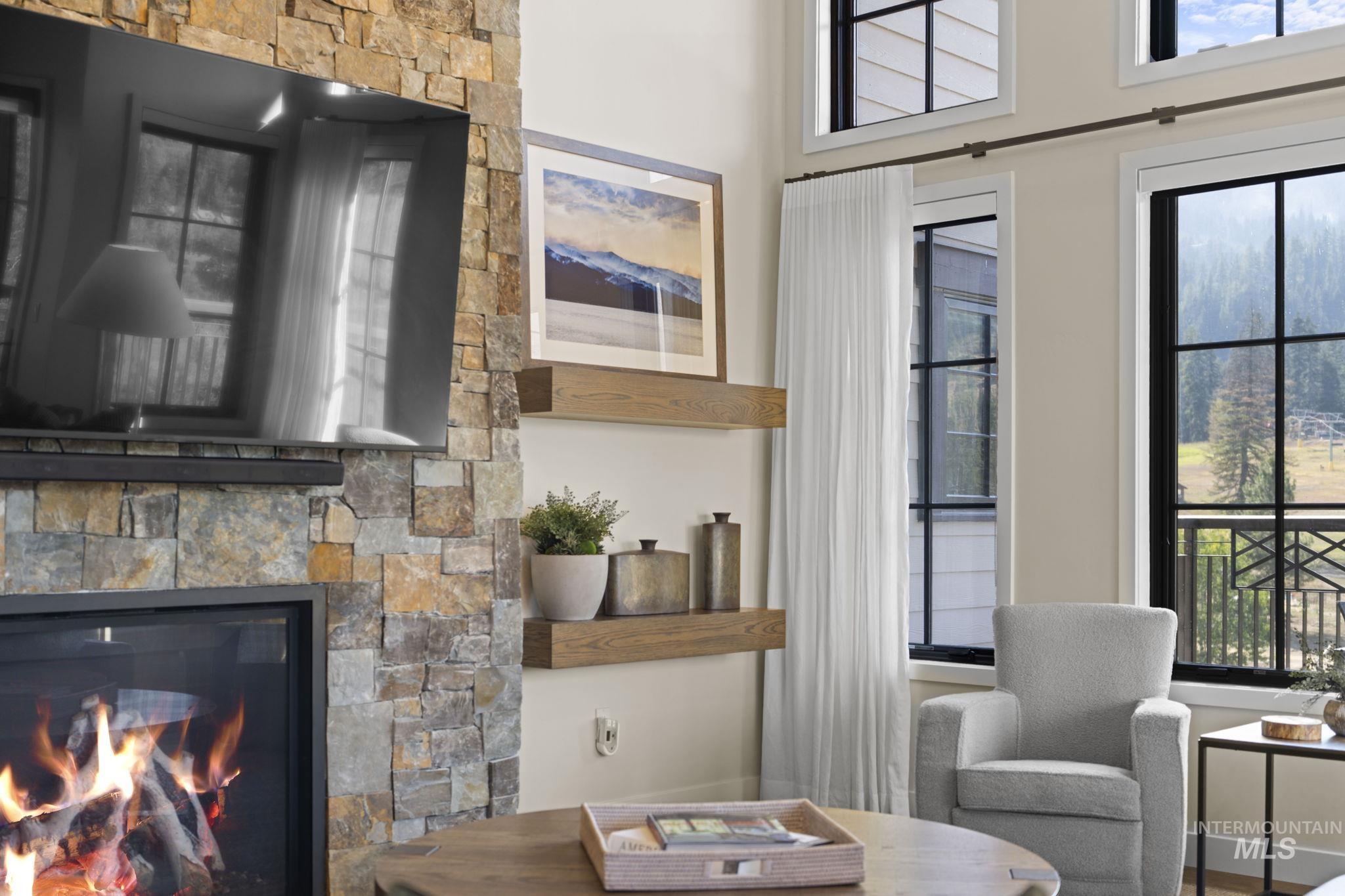 Sitting room featuring a fireplace