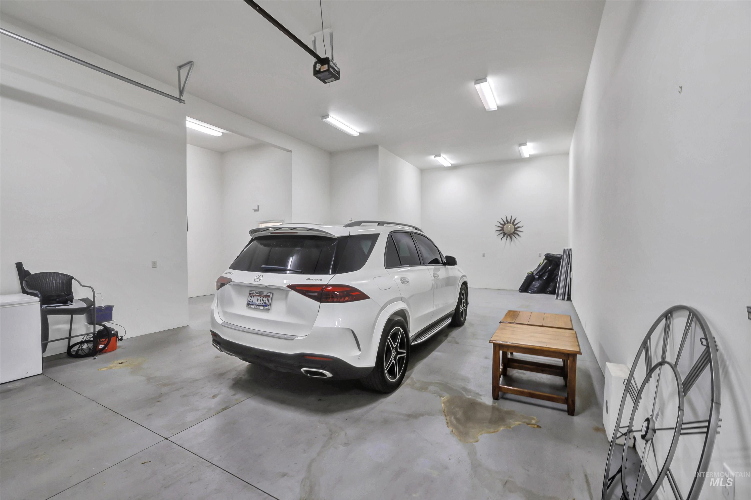 Garage with white fridge