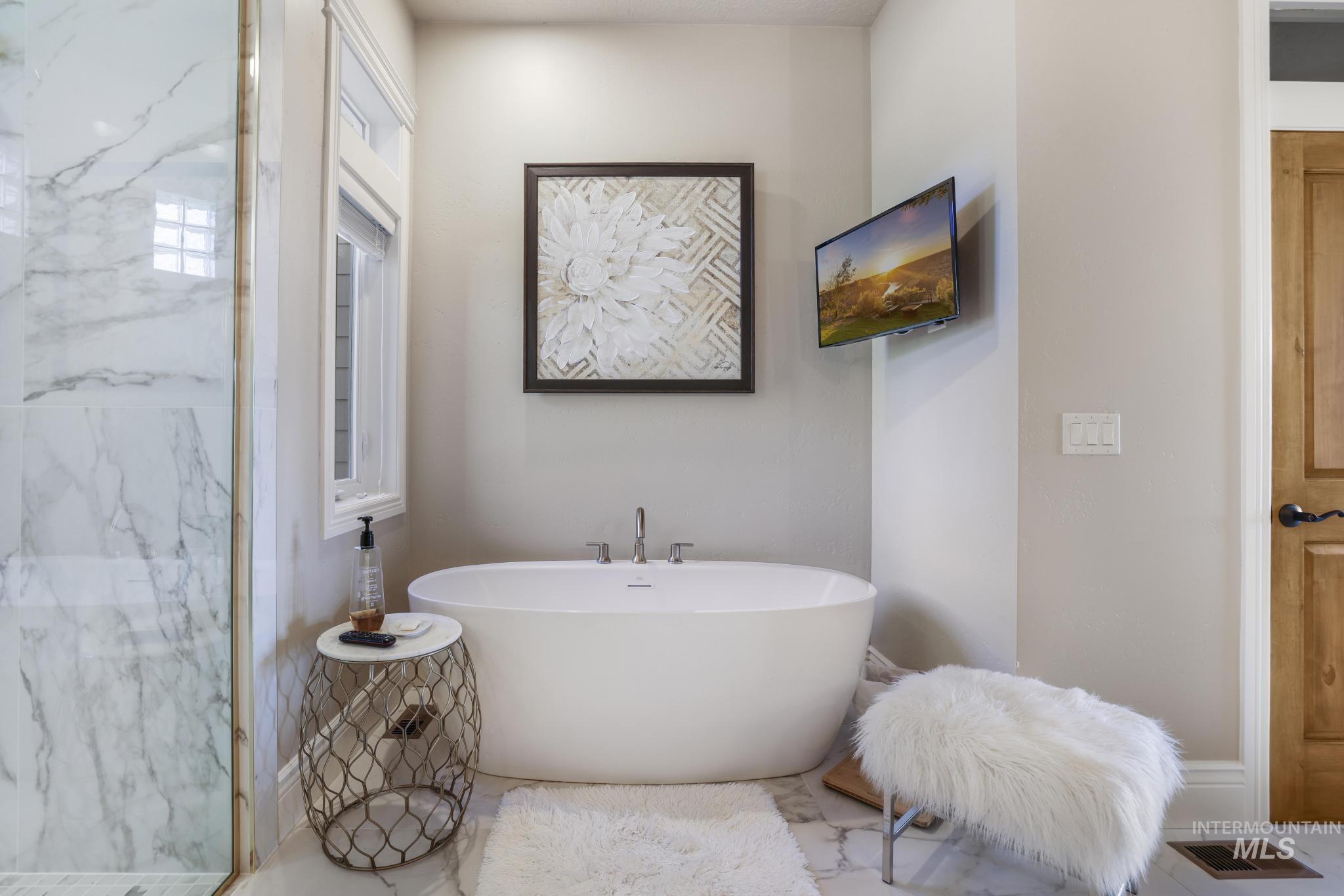 Bathroom with a soaking tub