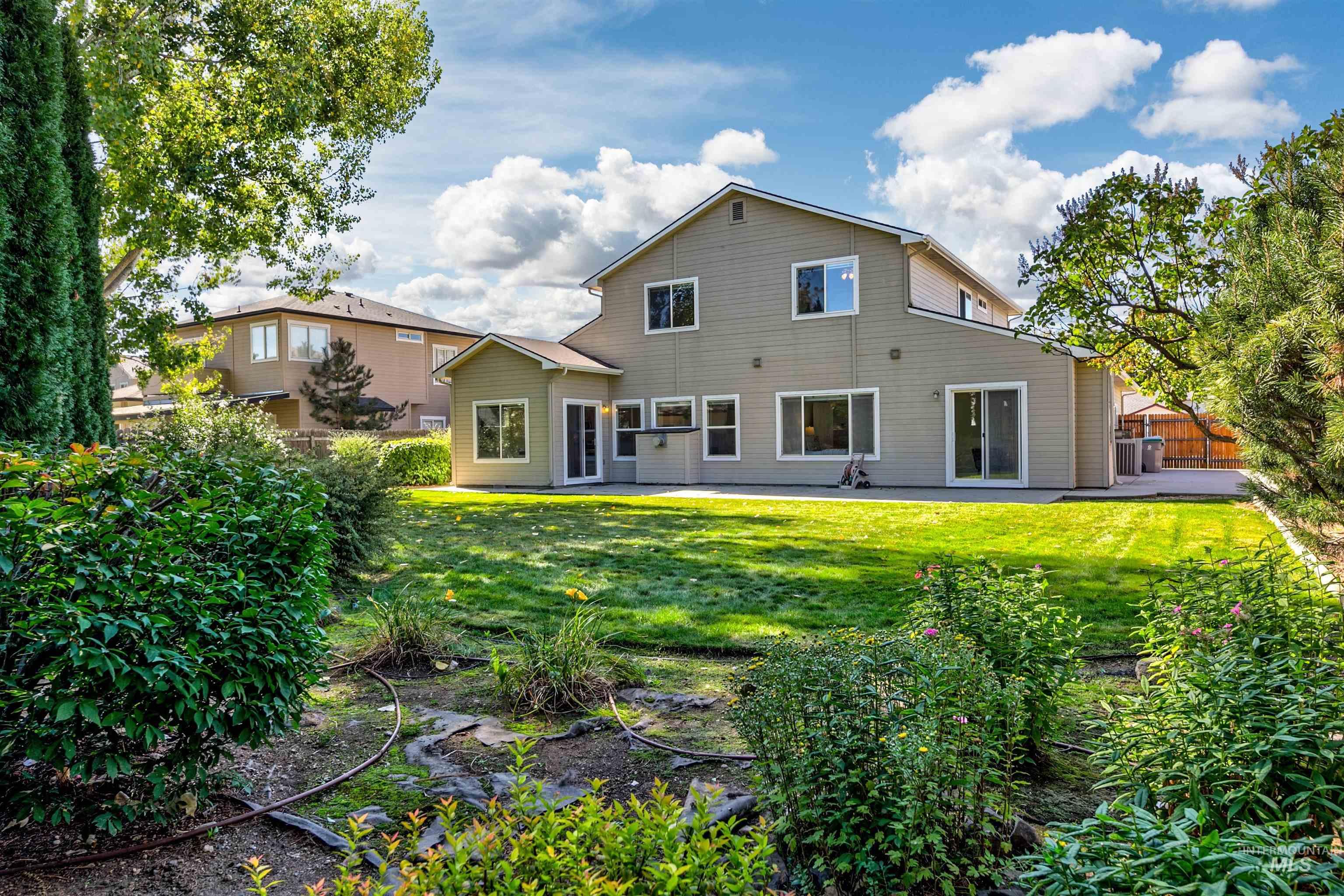 Rear view of house featuring a patio area
