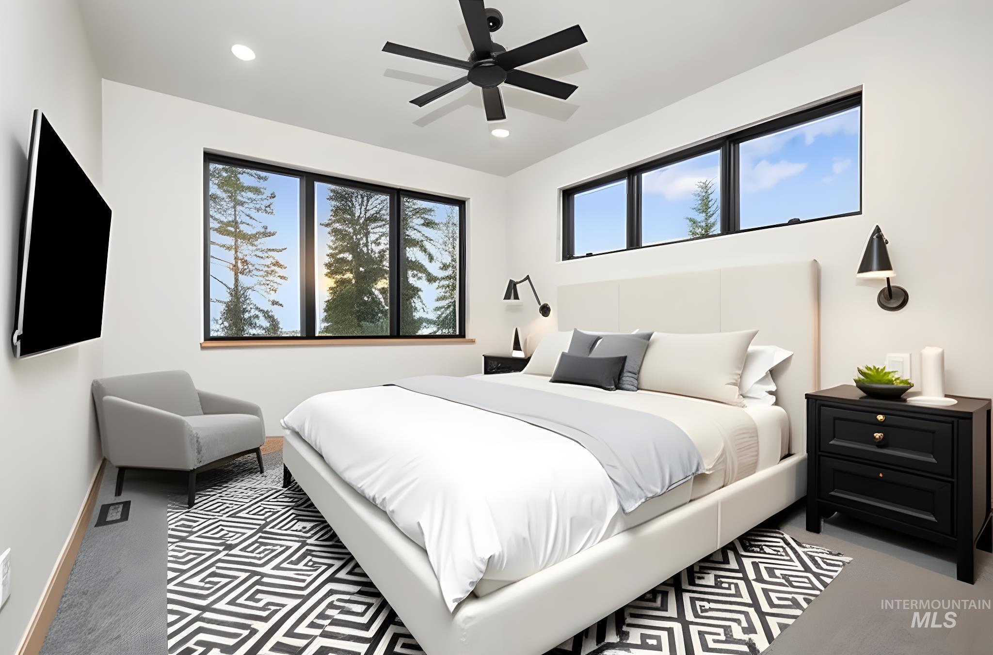 Carpeted bedroom with recessed lighting and a ceiling fan