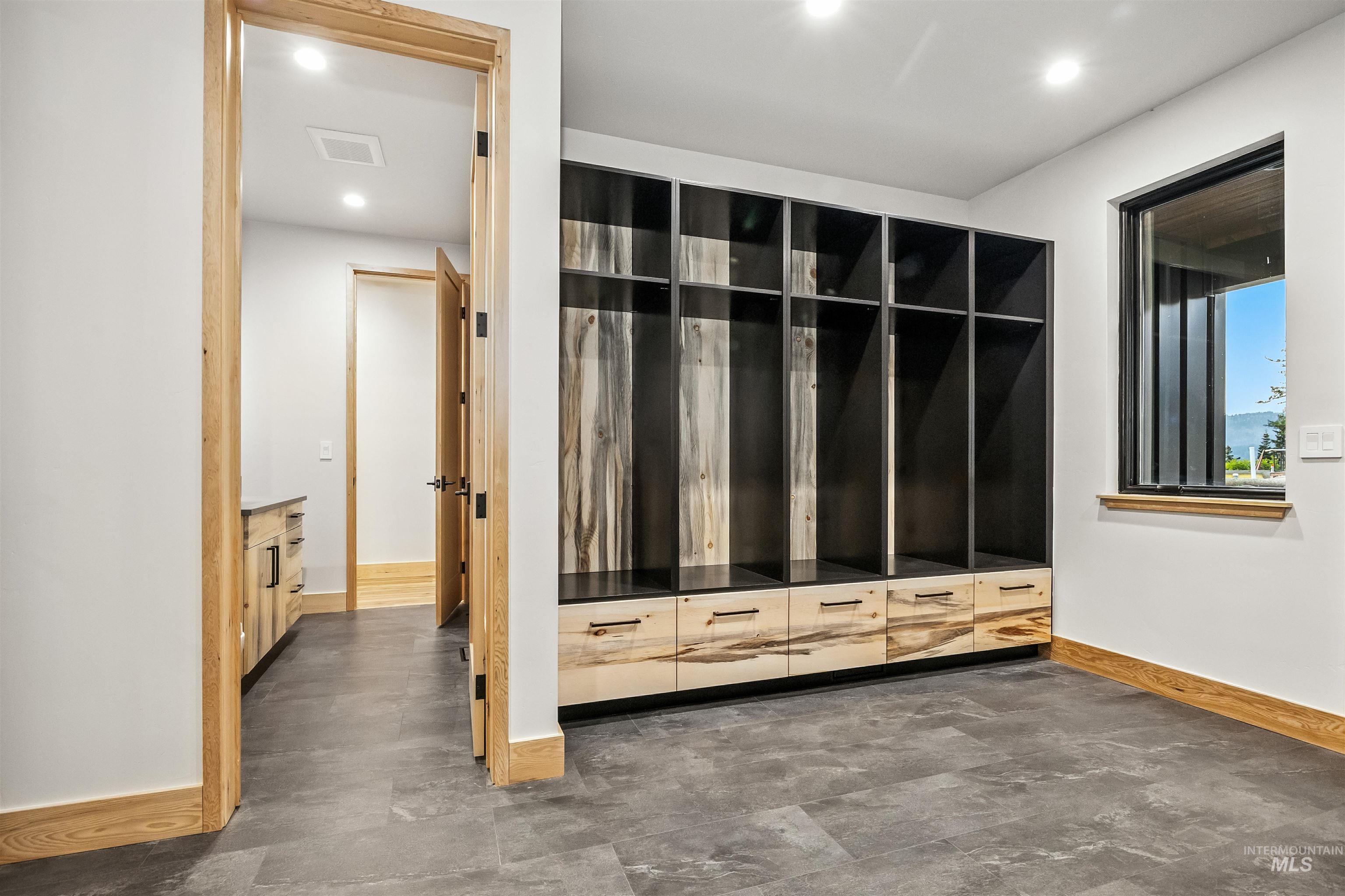 Mudroom featuring recessed lighting