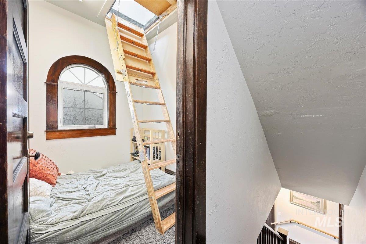 Bedroom with a skylight