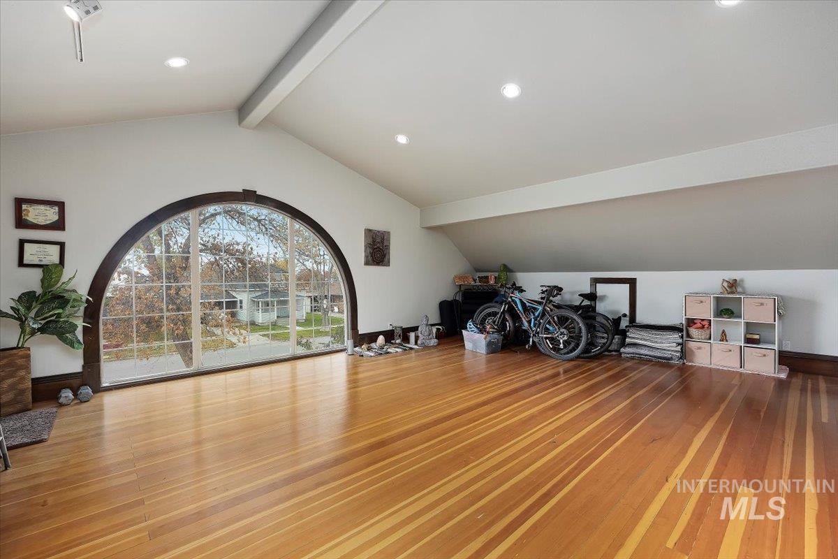 Interior space featuring wood finished floors and recessed lighting