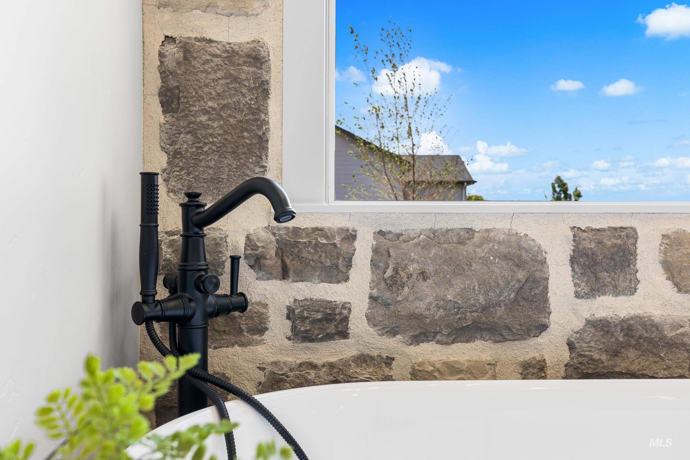 Bathroom view of stucco siding