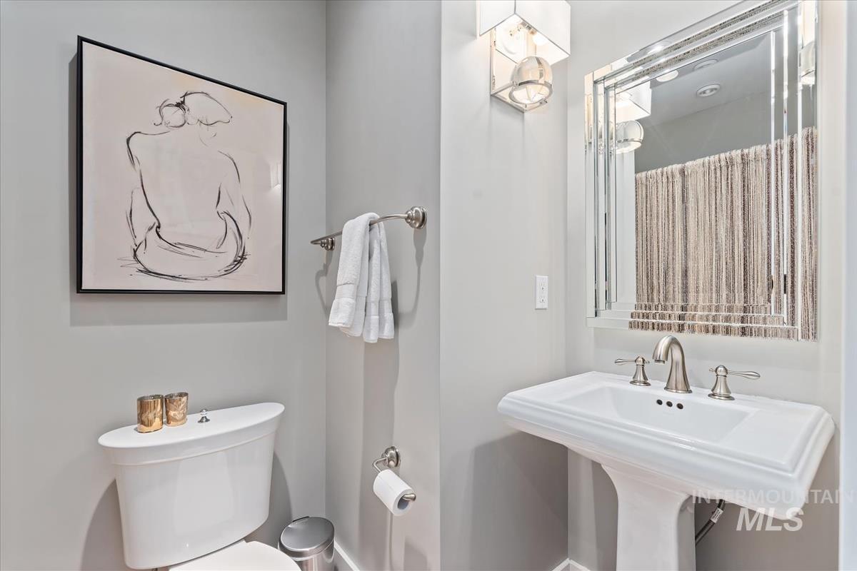 Bathroom featuring toilet and a sink