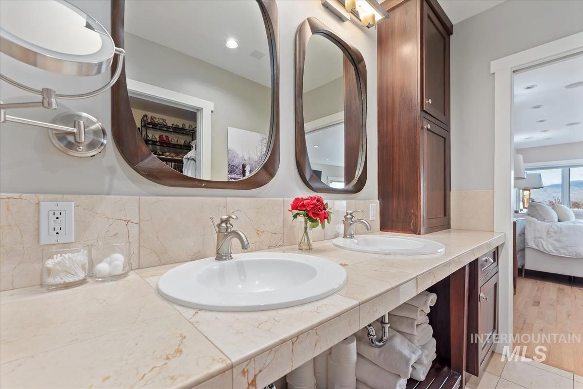 Bathroom with ensuite bathroom and double vanity