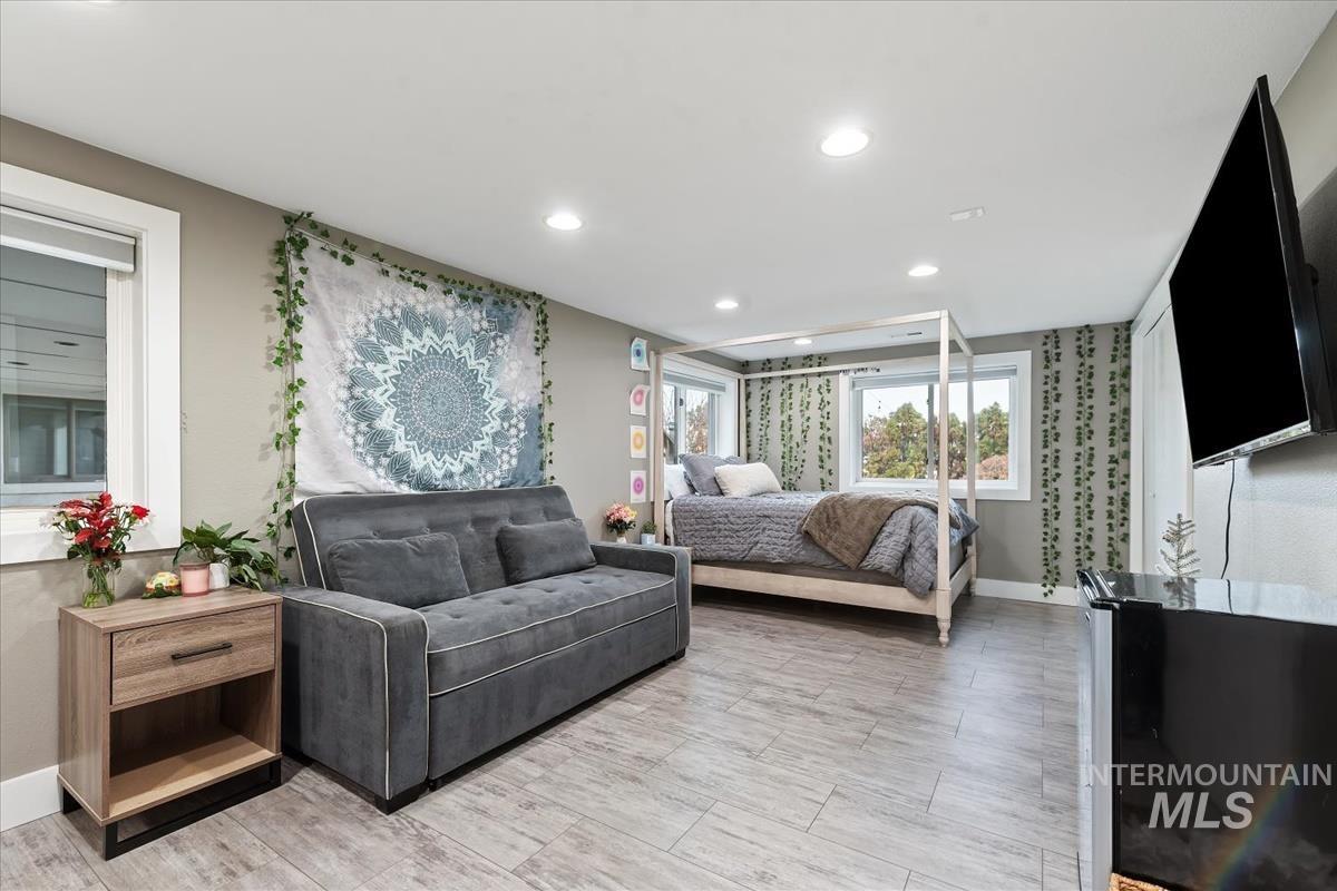 Bedroom featuring recessed lighting and baseboards
