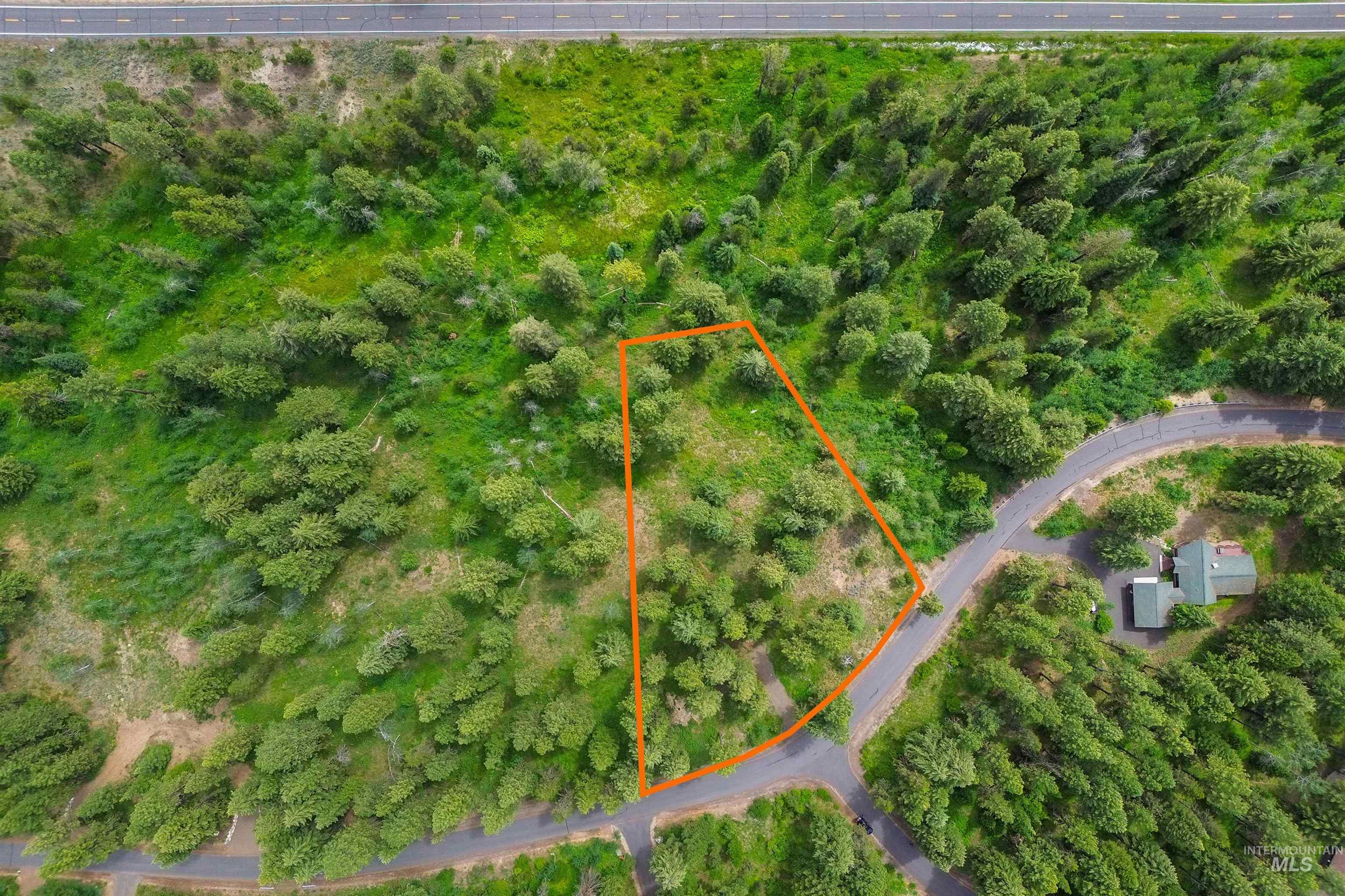 Aerial view of property's location featuring property parcel outlined