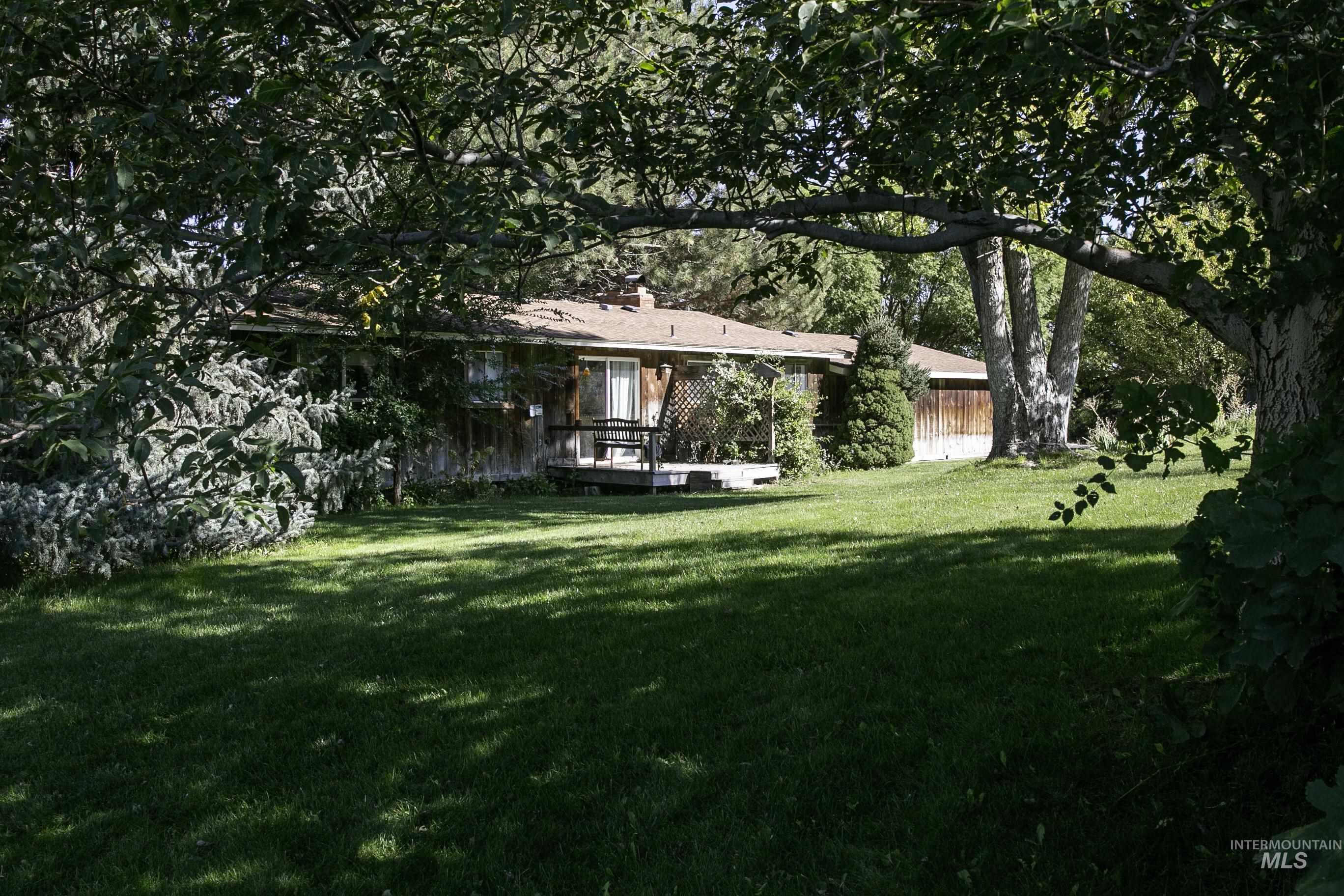 View of yard with a deck