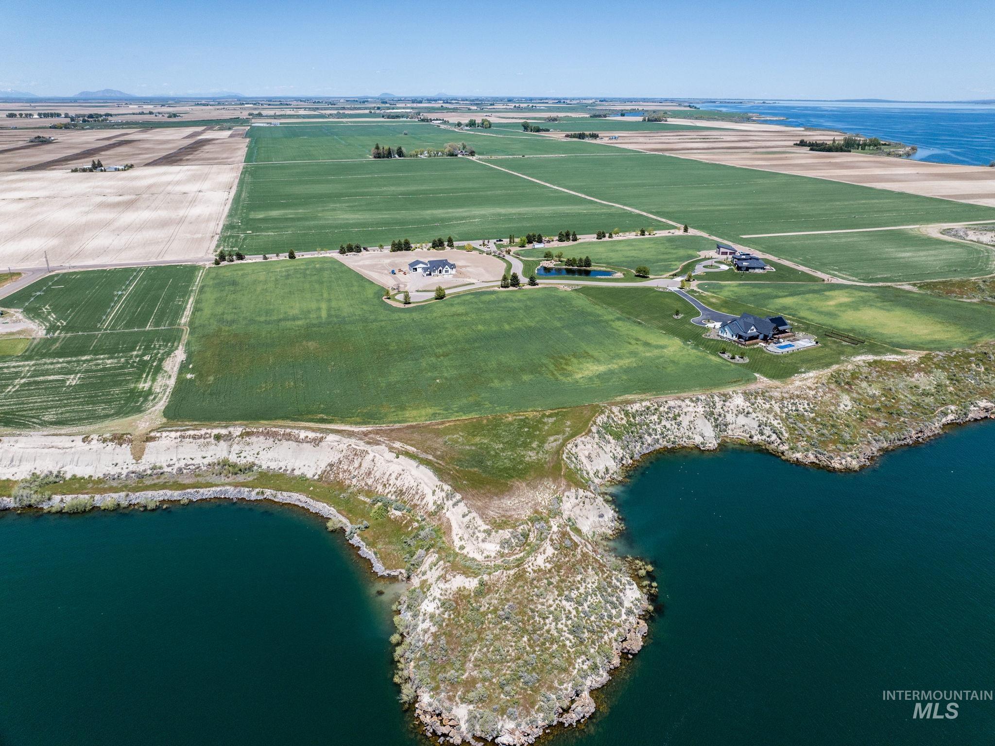 View of property location with a nearby body of water and rural landscape