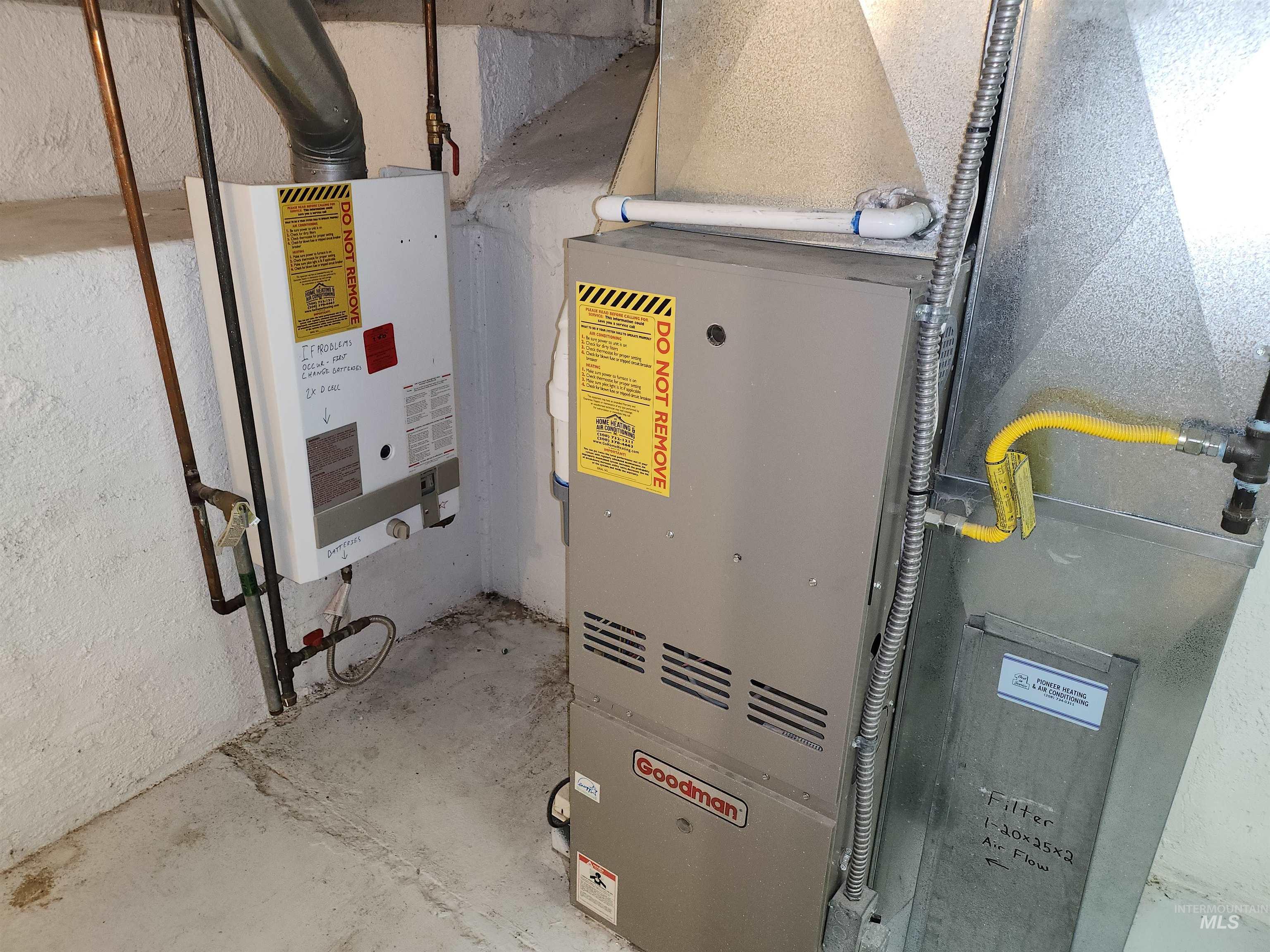 Utility room with heating unit and water heater