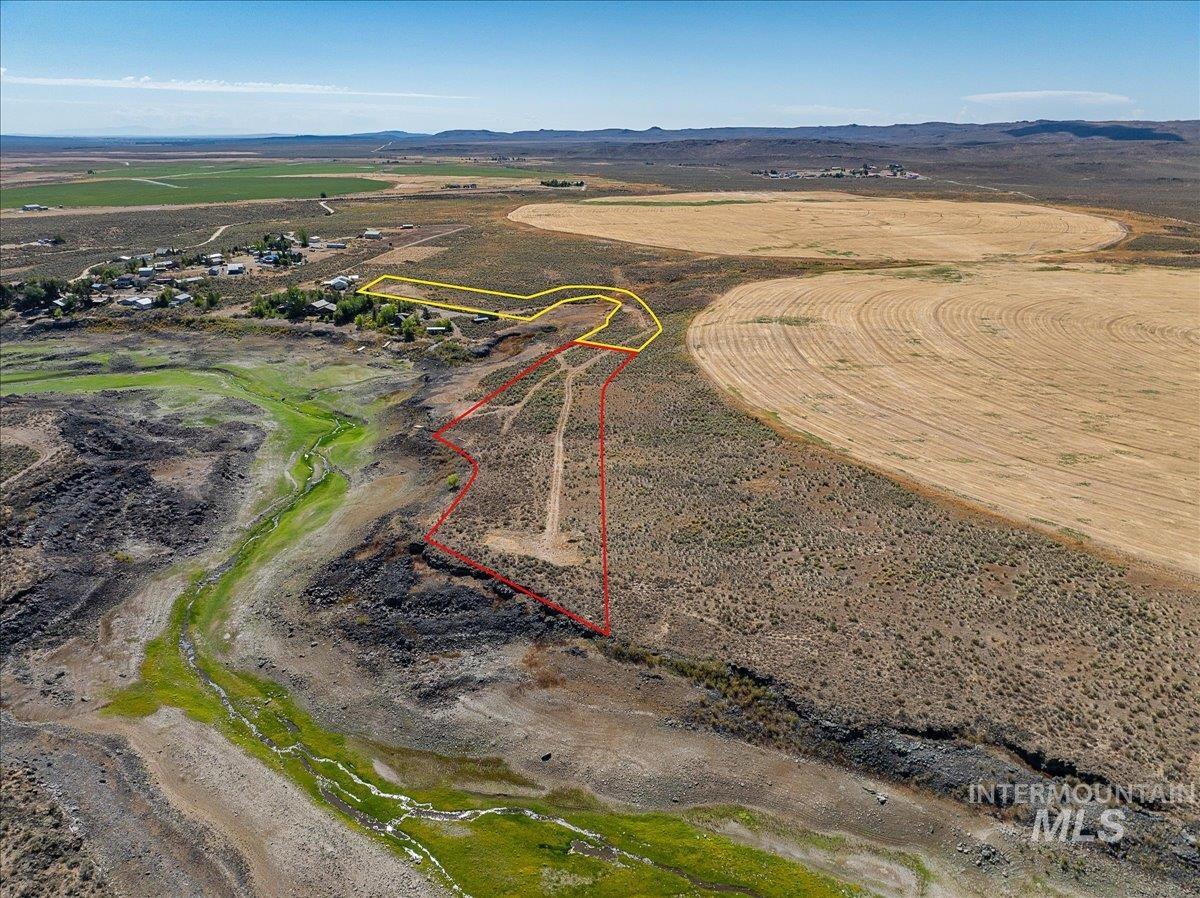 View of rural area featuring mountains and property parcel outlined