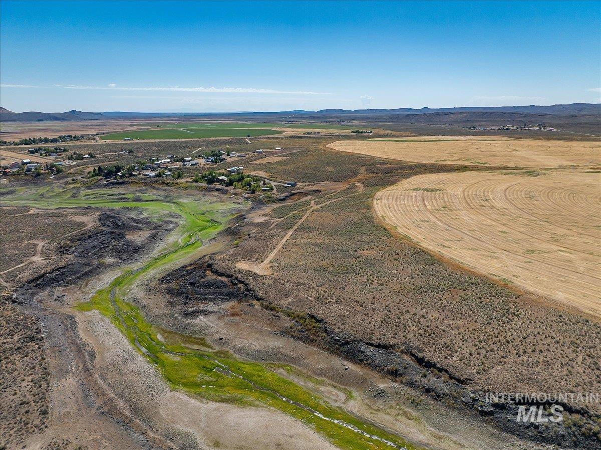 View of property location featuring rural landscape and a mountainous background