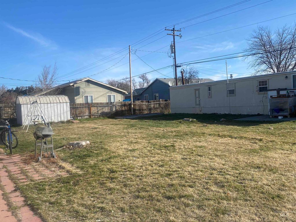 Photo of 1120 N 3rd E, Mountain Home, ID 83647 (MLS # 98977088)