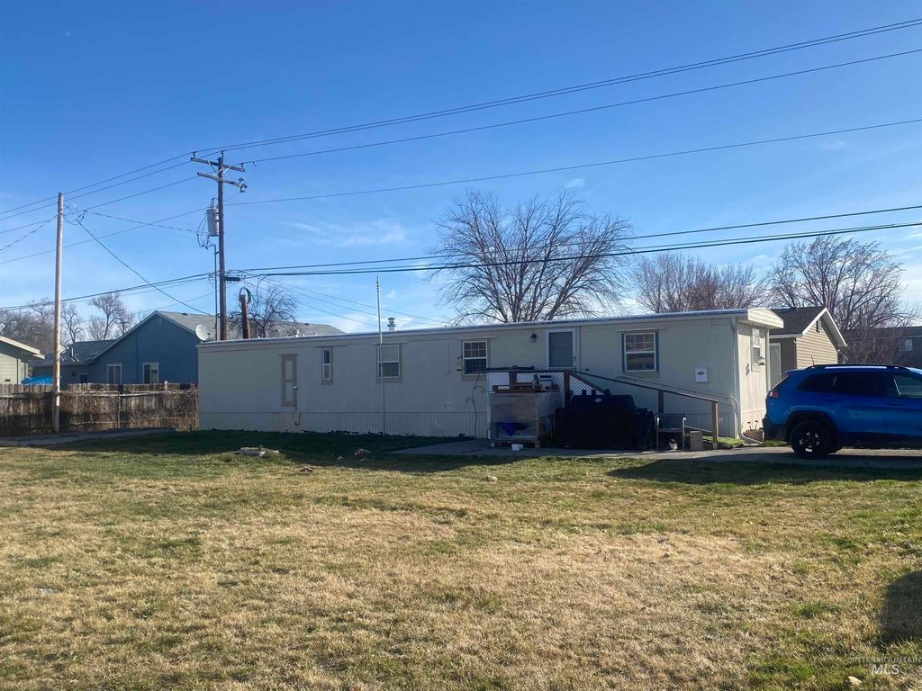 Photo of 1120 N 3rd E, Mountain Home, ID 83647 (MLS # 98977088)