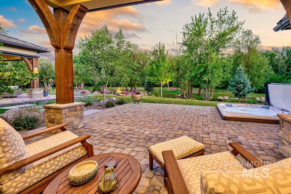 View of patio / terrace featuring a gazebo and a hot tub