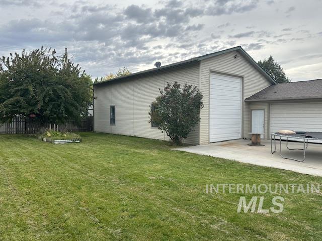 Rear view of property with a patio area