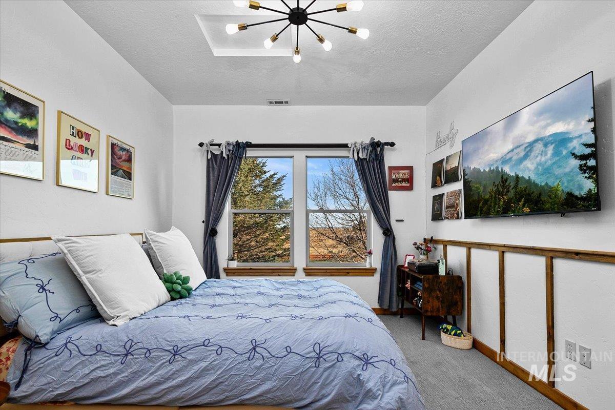 Recessed ceiling lighting with a modern sputnik-style chandelier