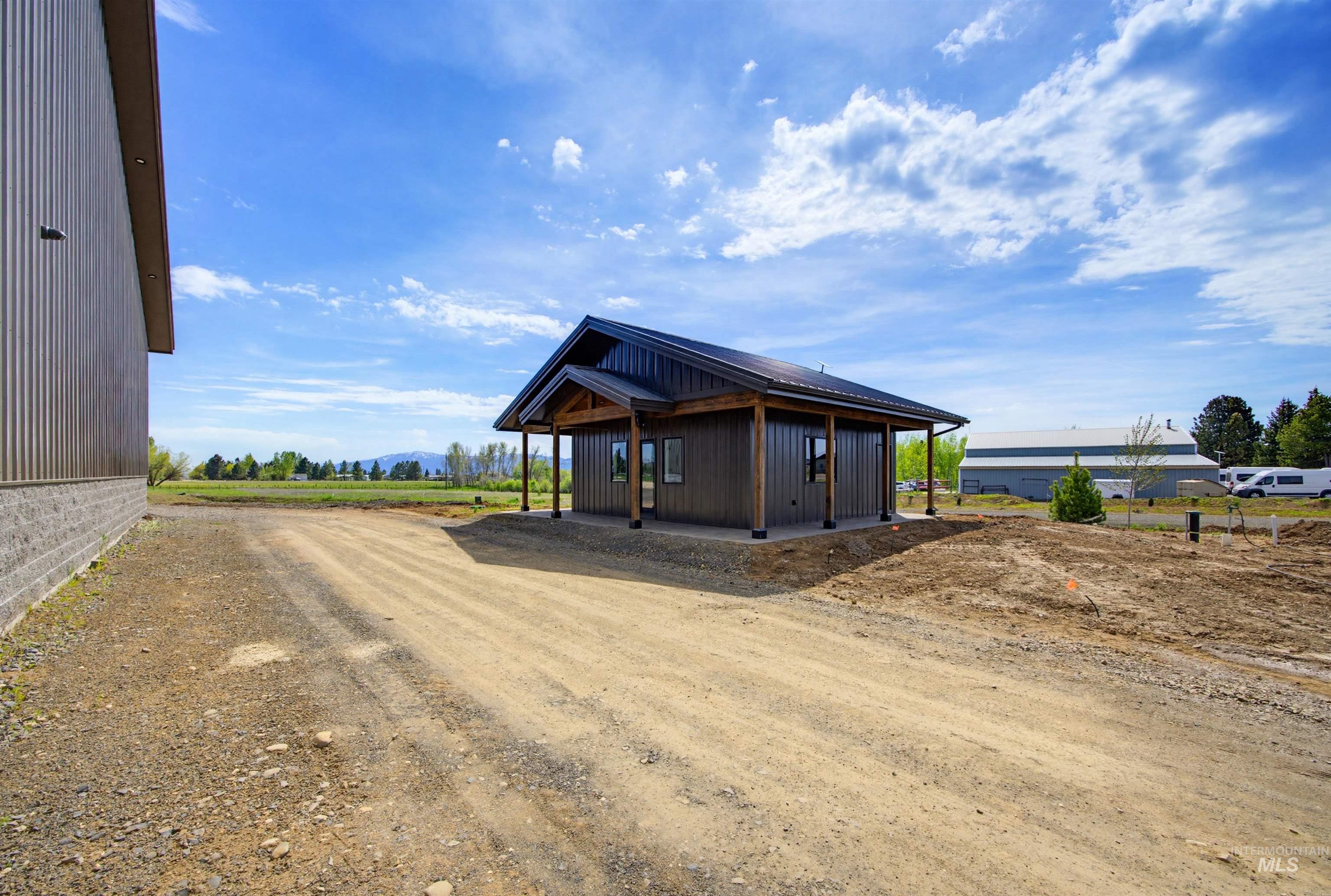 View of front of house with board and batten siding