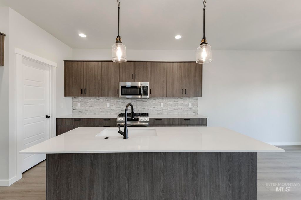 Photo of 6617 W Plateau Creek Dr, Meridian, ID 83646 (MLS # 98979904)