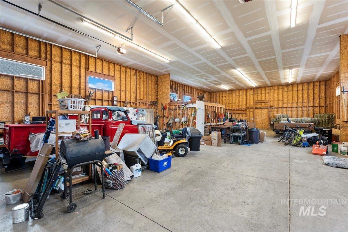 Garage featuring a workshop area