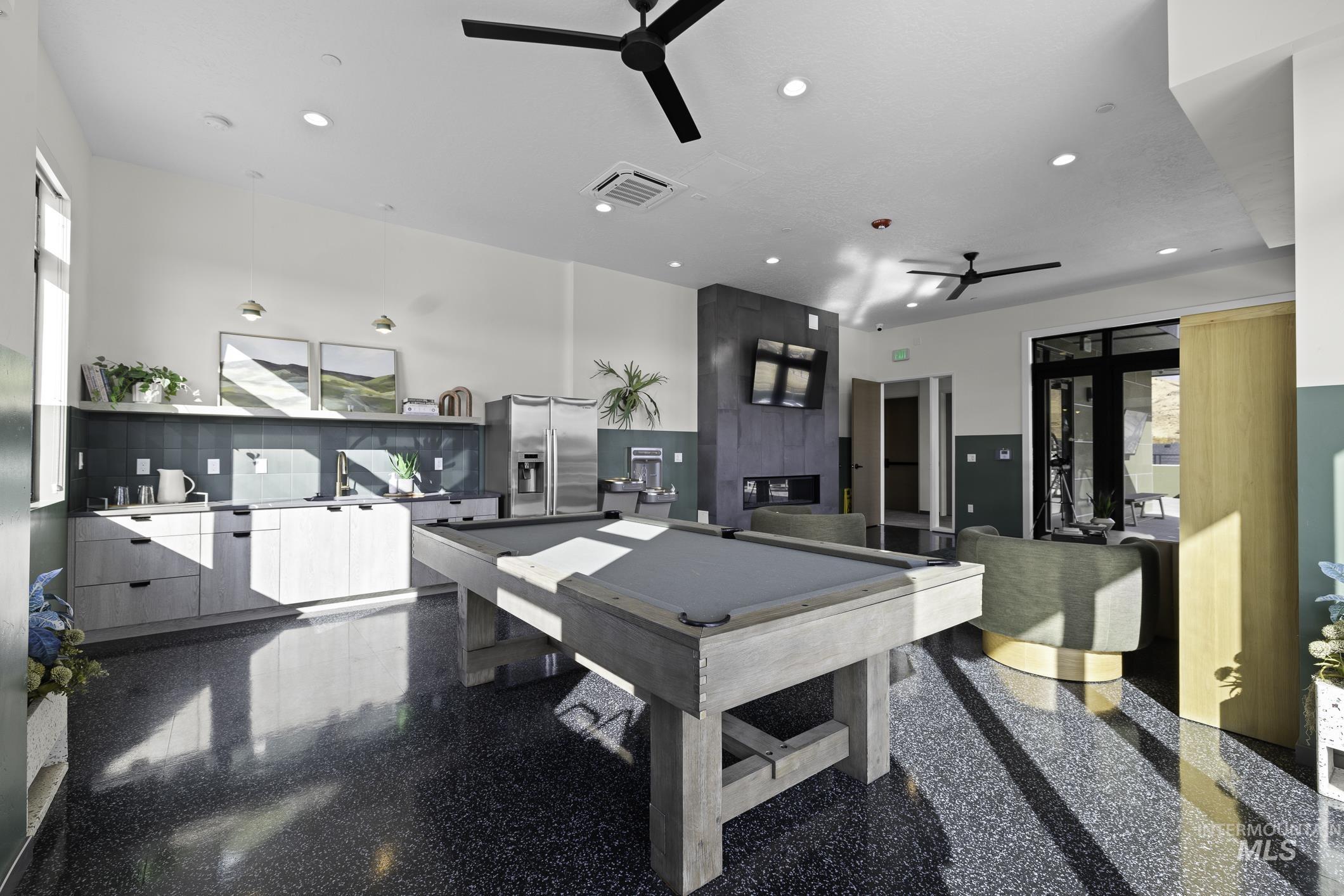 Recreation room featuring ceiling fan, granite tiled floors, pool table, and recessed lighting