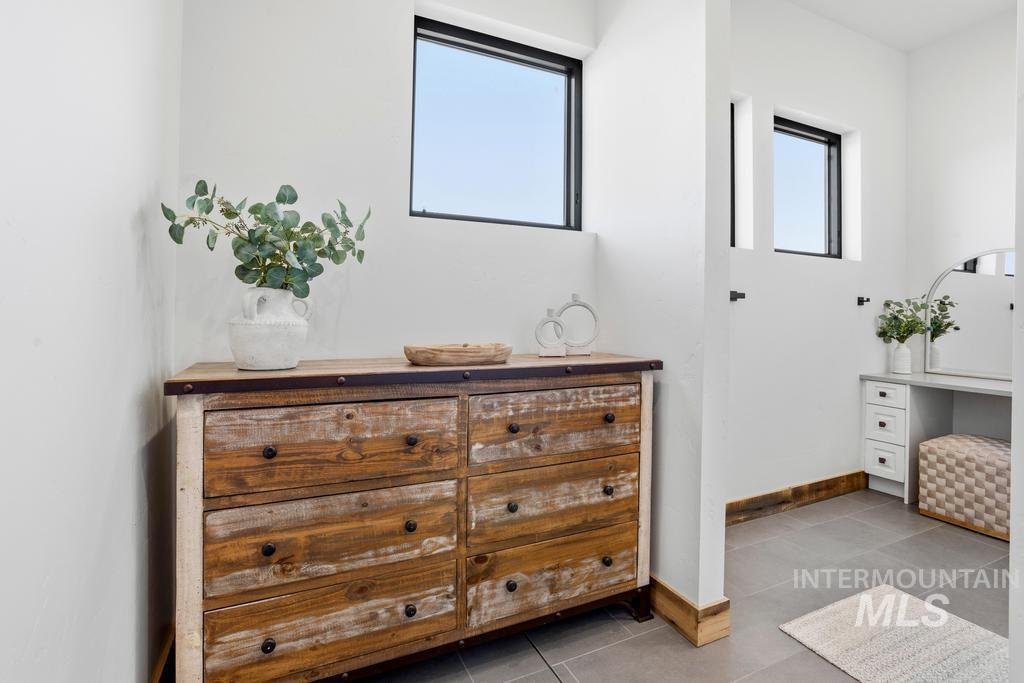 White walls accented by dark-framed windows