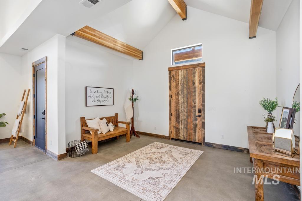 High vaulted ceilings with exposed wood beams