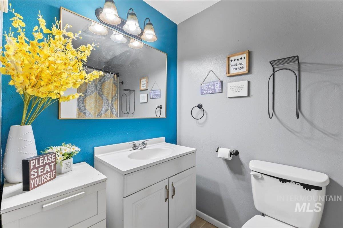 Bathroom featuring vanity and a shower with curtain